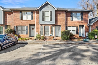 Enjoy townhome living on the 12th hole at Kings Grant in this on Kings Grant Golf and Country Club in North Carolina - for sale on GolfHomes.com, golf home, golf lot