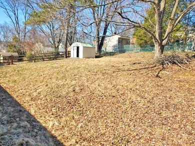 THIS RANCH BOASTS AN OPEN FLOOR PLAN WITH THE FORMAL LIVING ROOM on High Bridge Hills Golf Club in New Jersey - for sale on GolfHomes.com, golf home, golf lot