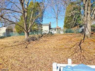 THIS RANCH BOASTS AN OPEN FLOOR PLAN WITH THE FORMAL LIVING ROOM on High Bridge Hills Golf Club in New Jersey - for sale on GolfHomes.com, golf home, golf lot