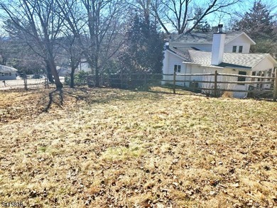 THIS RANCH BOASTS AN OPEN FLOOR PLAN WITH THE FORMAL LIVING ROOM on High Bridge Hills Golf Club in New Jersey - for sale on GolfHomes.com, golf home, golf lot