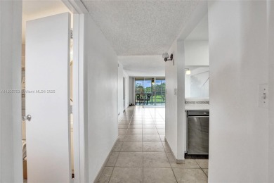 This charming 2-bedroom, 2-bathroom condo offers the perfect on Pine Island Ridge Country Club in Florida - for sale on GolfHomes.com, golf home, golf lot
