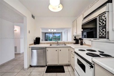 This charming 2-bedroom, 2-bathroom condo offers the perfect on Pine Island Ridge Country Club in Florida - for sale on GolfHomes.com, golf home, golf lot