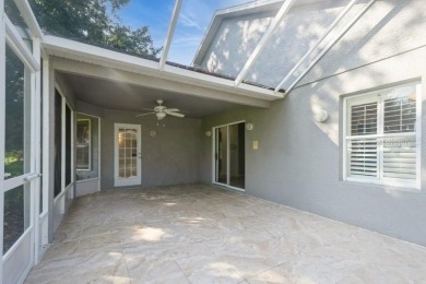 FABULOUS HOME ON GOLF COURSE ~ Move-In-Ready! This lovely on Meadow Oaks Golf and Country Club in Florida - for sale on GolfHomes.com, golf home, golf lot