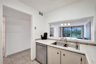 This charming 2-bedroom, 2-bathroom condo offers the perfect on Pine Island Ridge Country Club in Florida - for sale on GolfHomes.com, golf home, golf lot