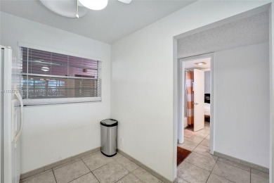 This charming 2-bedroom, 2-bathroom condo offers the perfect on Pine Island Ridge Country Club in Florida - for sale on GolfHomes.com, golf home, golf lot