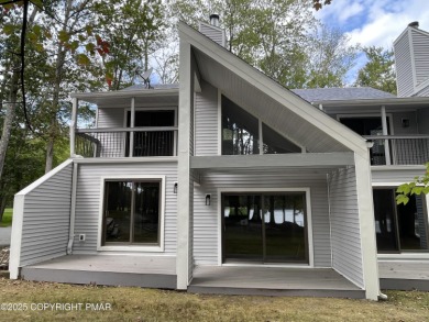 Unbeatable location nestled directly between the tranquil shores on Paupack Hills Golf and Country Club in Pennsylvania - for sale on GolfHomes.com, golf home, golf lot