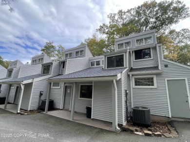 Unbeatable location nestled directly between the tranquil shores on Paupack Hills Golf and Country Club in Pennsylvania - for sale on GolfHomes.com, golf home, golf lot