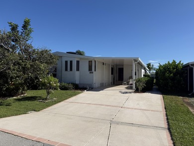 Enjoy waterfront living LAND OWNED in the highly sought-after on Savanna Golf Club in Florida - for sale on GolfHomes.com, golf home, golf lot