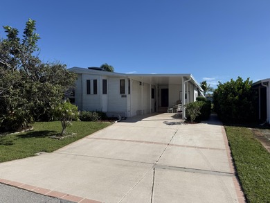 Enjoy waterfront living LAND OWNED in the highly sought-after on Savanna Golf Club in Florida - for sale on GolfHomes.com, golf home, golf lot