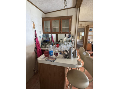 Enjoy waterfront living LAND OWNED in the highly sought-after on Savanna Golf Club in Florida - for sale on GolfHomes.com, golf home, golf lot