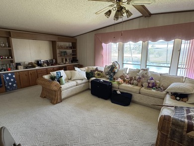 Enjoy waterfront living LAND OWNED in the highly sought-after on Savanna Golf Club in Florida - for sale on GolfHomes.com, golf home, golf lot