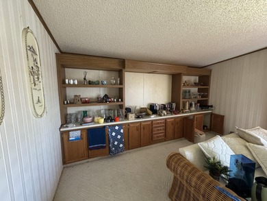 Enjoy waterfront living LAND OWNED in the highly sought-after on Savanna Golf Club in Florida - for sale on GolfHomes.com, golf home, golf lot