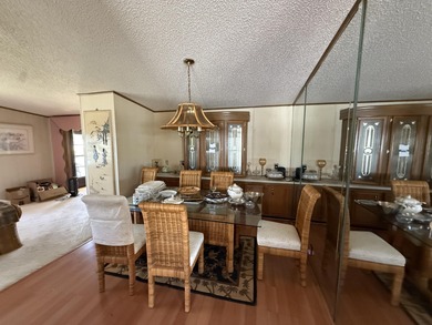 Enjoy waterfront living LAND OWNED in the highly sought-after on Savanna Golf Club in Florida - for sale on GolfHomes.com, golf home, golf lot