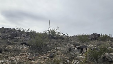 1.38 ACRE CUSTOM HOMESITE IN VERRADO. A natural foothill on Verrado Golf Club  in Arizona - for sale on GolfHomes.com, golf home, golf lot