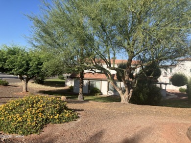Lush & lovely grounds of Los Lagos Condo's.  Nice 'penthouse on Bridgewater Links in Arizona - for sale on GolfHomes.com, golf home, golf lot