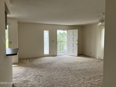 Lush & lovely grounds of Los Lagos Condo's.  Nice 'penthouse on Bridgewater Links in Arizona - for sale on GolfHomes.com, golf home, golf lot