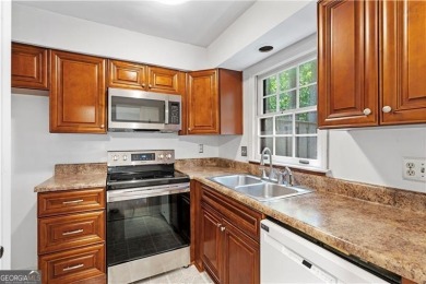 Desirable end-unit 2-bedroom, 1.5-bathroom townhome in on Cross Creek Golf Course in Georgia - for sale on GolfHomes.com, golf home, golf lot
