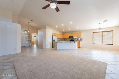 Discover this spacious home on a prime corner lot in the Augusta on Augusta Ranch Golf Club in Arizona - for sale on GolfHomes.com, golf home, golf lot