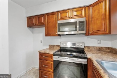 Desirable end-unit 2-bedroom, 1.5-bathroom townhome in on Cross Creek Golf Course in Georgia - for sale on GolfHomes.com, golf home, golf lot