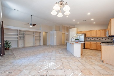 Discover this spacious home on a prime corner lot in the Augusta on Augusta Ranch Golf Club in Arizona - for sale on GolfHomes.com, golf home, golf lot