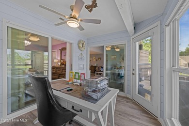 Enjoy effortless waterfront living in this beautifully updated on Harbour Point Golf Club in North Carolina - for sale on GolfHomes.com, golf home, golf lot