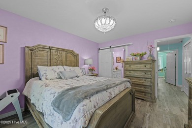 Enjoy effortless waterfront living in this beautifully updated on Harbour Point Golf Club in North Carolina - for sale on GolfHomes.com, golf home, golf lot