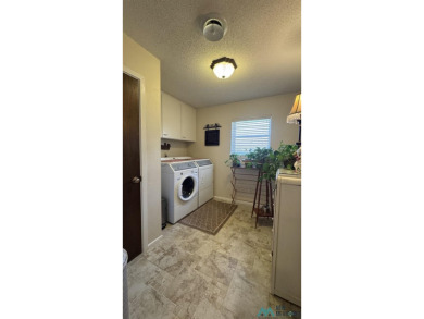 Would you like to live close to the golf course where you can on Lovington Country Club in New Mexico - for sale on GolfHomes.com, golf home, golf lot