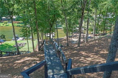 Lakefront Living in Sought-After Lake Arrowhead! Welcome to this on The Highlands Course at Lake Arrowhead in Georgia - for sale on GolfHomes.com, golf home, golf lot