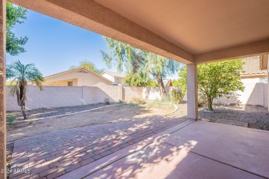 Discover this spacious home on a prime corner lot in the Augusta on Augusta Ranch Golf Club in Arizona - for sale on GolfHomes.com, golf home, golf lot