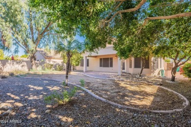 Discover this spacious home on a prime corner lot in the Augusta on Augusta Ranch Golf Club in Arizona - for sale on GolfHomes.com, golf home, golf lot