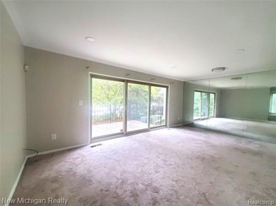 Beautifully updated end-unit brick condo in the highly desirable on Great Oaks Country Club in Michigan - for sale on GolfHomes.com, golf home, golf lot