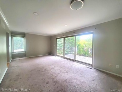 Beautifully updated end-unit brick condo in the highly desirable on Great Oaks Country Club in Michigan - for sale on GolfHomes.com, golf home, golf lot