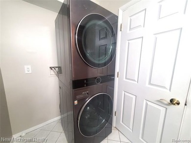 Beautifully updated end-unit brick condo in the highly desirable on Great Oaks Country Club in Michigan - for sale on GolfHomes.com, golf home, golf lot