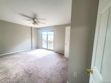 Beautifully updated end-unit brick condo in the highly desirable on Great Oaks Country Club in Michigan - for sale on GolfHomes.com, golf home, golf lot