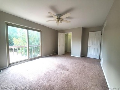 Beautifully updated end-unit brick condo in the highly desirable on Great Oaks Country Club in Michigan - for sale on GolfHomes.com, golf home, golf lot
