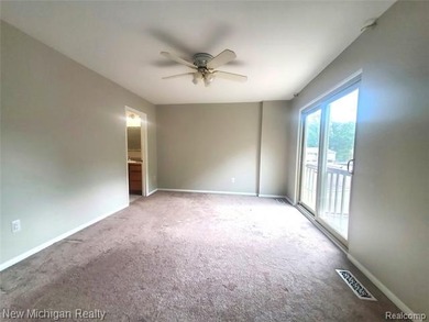 Beautifully updated end-unit brick condo in the highly desirable on Great Oaks Country Club in Michigan - for sale on GolfHomes.com, golf home, golf lot