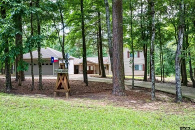 Welcome to your ideal lakefront retreat in the highly desirable on Holly Lake Ranch Golf Club in Texas - for sale on GolfHomes.com, golf home, golf lot