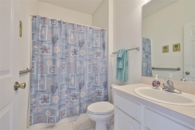 This charming 2-bedroom, 2-bathroom villa offers a serene and on Scepter Golf Club in Florida - for sale on GolfHomes.com, golf home, golf lot