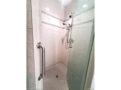 Beautifully updated end-unit brick condo in the highly desirable on Great Oaks Country Club in Michigan - for sale on GolfHomes.com, golf home, golf lot