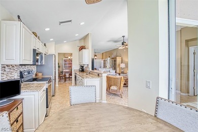 Welcome to your dream home in the prestigious Colonial Country on Colonial Country Club in Florida - for sale on GolfHomes.com, golf home, golf lot