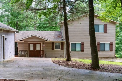 Welcome to your ideal lakefront retreat in the highly desirable on Holly Lake Ranch Golf Club in Texas - for sale on GolfHomes.com, golf home, golf lot