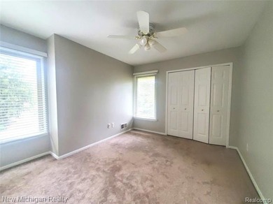 Beautifully updated end-unit brick condo in the highly desirable on Great Oaks Country Club in Michigan - for sale on GolfHomes.com, golf home, golf lot