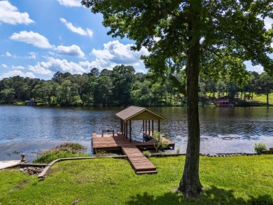 Welcome to your ideal lakefront retreat in the highly desirable on Holly Lake Ranch Golf Club in Texas - for sale on GolfHomes.com, golf home, golf lot