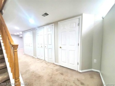 Beautifully updated end-unit brick condo in the highly desirable on Great Oaks Country Club in Michigan - for sale on GolfHomes.com, golf home, golf lot