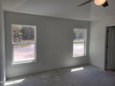 This BRAND-NEW Custom-built home offers modern living and on Deerfield Lakes Golf Club in Florida - for sale on GolfHomes.com, golf home, golf lot