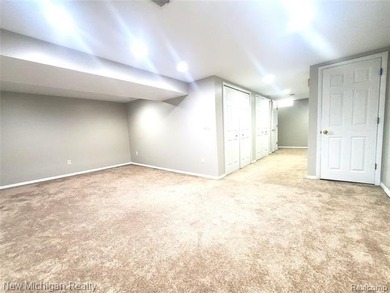 Beautifully updated end-unit brick condo in the highly desirable on Great Oaks Country Club in Michigan - for sale on GolfHomes.com, golf home, golf lot