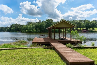 Welcome to your ideal lakefront retreat in the highly desirable on Holly Lake Ranch Golf Club in Texas - for sale on GolfHomes.com, golf home, golf lot