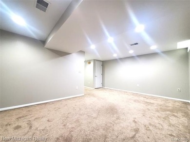 Beautifully updated end-unit brick condo in the highly desirable on Great Oaks Country Club in Michigan - for sale on GolfHomes.com, golf home, golf lot