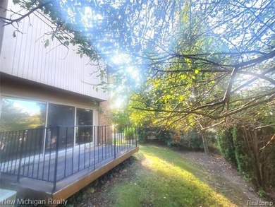 Beautifully updated end-unit brick condo in the highly desirable on Great Oaks Country Club in Michigan - for sale on GolfHomes.com, golf home, golf lot