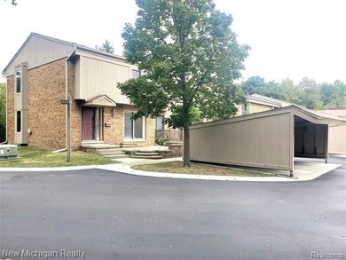 Beautifully updated end-unit brick condo in the highly desirable on Great Oaks Country Club in Michigan - for sale on GolfHomes.com, golf home, golf lot